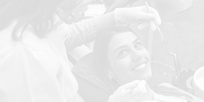 Woman smiling during dental exam