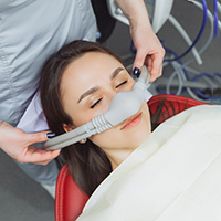 woman getting dental sedation  