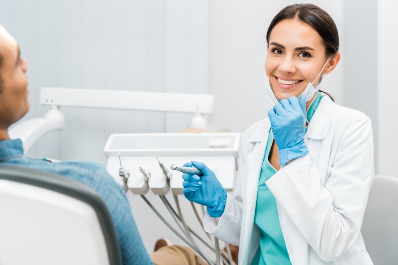 patient talking to their dentist